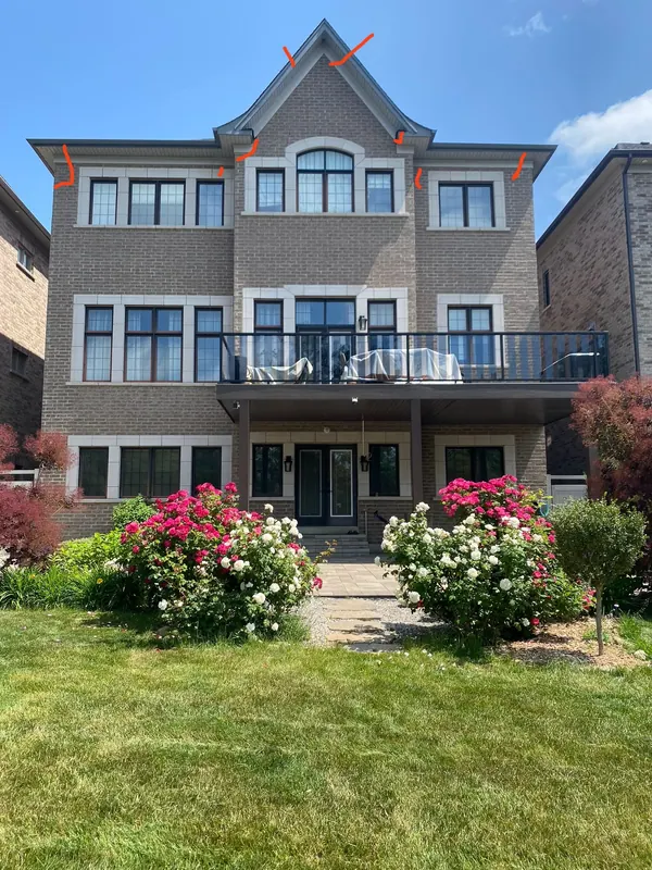 Photo of a house marked in red with the planned potlight positions