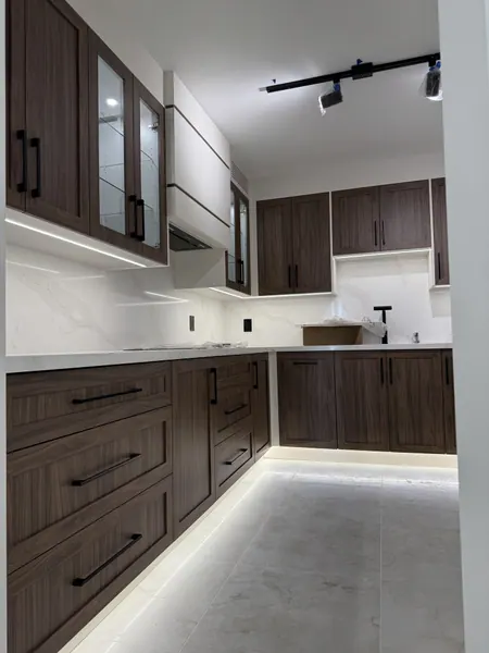 Kitchen with LED under-cabinet and toe-kick lighting