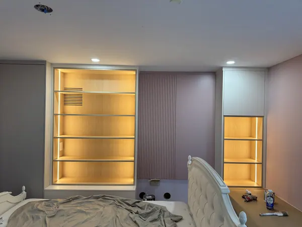 Built-in shelving with warm LED lighting