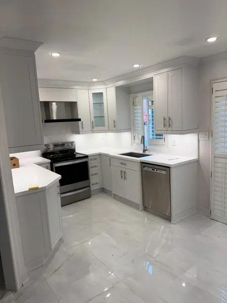 Bright white kitchen with recessed potlights